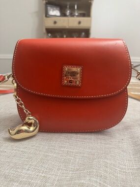Dooney & Bourke Orange-Red Leather Crossbody with Gold Duck Charm